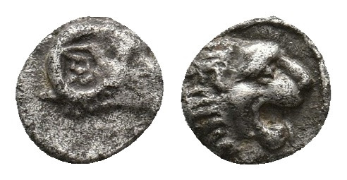 CARIA. Uncertain. (Circa 400 BC). AR Tetartemorion. 0.22 g. 6.20 mm.