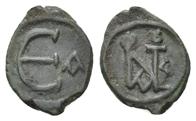 JUSTIN II, 565-578 AD. AE, Pentanummium. 2.09 g. 17.80 mm.