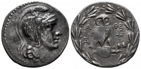 Attica. Athens. New Style Tetradrachm. 165/4 BC. (Thompson-pl. 8, 56/64). Anv.: Head of Athena right, wearing crested Attic helmet decorated with vine...