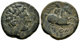 Seteisken. Unit. 120-20 BC. Sástago (Zaragoza). (Abh-2214). (Acip-1459). Anv.: Male head right, two dolphins before, crescent behind. Rev.: Horseman r...