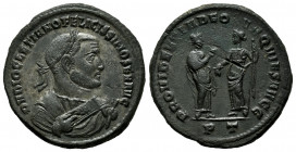 Diocletian. Follis. 305 AD. Ticinum. (Ric-VI 57a). Anv.: D N DIOCLETIANO FELICISSIMO SEN AVG, laureate bust to right, wearing imperial mantle, holding...