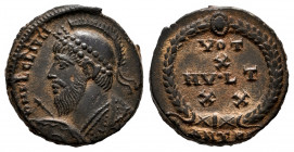 Julian II Apostata. Follis. 361-363 AD. Antioch. (Ric-VIII 220). (LRBC-2642). Anv.: D N FL CL IVLI(ANS P F AVG), pearl-diademed, helmeted and cuirasse...