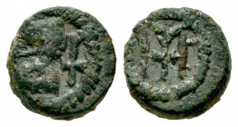 Nummus. 6th century. Toleto (Toledo). (Crusafont-group D, type 44). Anv.: Bust to the right, in front of the cross and around the border of lines. Rev...
