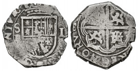 Philip II (1556-1598). 1 real. (1597 o 1598). Sevilla. B. (Cal-275/6). Ag. 3,34 g. "OMNIVM" type. Choice F/Almost VF. Est...50,00. 

Spanish Descrip...