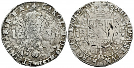 Charles II (1665-1700). 1 patagon. 1672. Bruges. (Delm-344). (Dav-4494). Ag. 27,83 g. Almost VF. Est...170,00. 

Spanish Description: Carlos II (166...