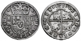 Philip V (1700-1746). 2 reales. 1717. Segovia. J. (Cal-944). Ag. 5,78 g. Aqueduct with one row of two arches. End of planchet. Almost XF. Est...170,00...