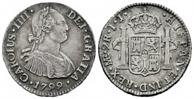 Charles IV (1788-1808). 2 reales. 1799. Lima. IJ. (Cal-582). Ag. 6,46 g. Patina. Choice VF/VF. Est...75,00. 

Spanish Description: Carlos IV (1788-1...