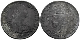 Charles IV (1788-1808). 8 reales. 1799. Mexico. FM. (Cal-963). Ag. 26,93 g. Partially rusted. Dark patina. Choice VF. Est...50,00. 

Spanish Descrip...