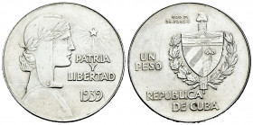 Cuba. 1 peso. 1939. (Km-22). Ag. 26,66 g. Almost XF. Est...60,00. 

Spanish Description: Cuba. 1 peso. 1939. (Km-22). Ag. 26,66 g. EBC-. Est...60,00...