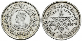 Morocoo. Mohamad V. 500 francs. 1956 (1376 H). (Km-Y54). Ag. 22,49 g. Almost XF. Est...35,00. 

Spanish Description: Marruecos. Mohamad V. 500 franc...