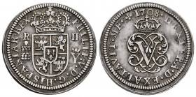 Philip V (1700-1746). 2 reales. 1708. Segovia. Y. (Cal-940). Ag. 5,52 g. Right palm above left palm. Scarce. VF. Est...180,00. 

Spanish Description...