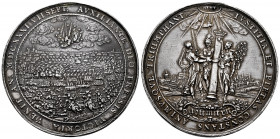 Germany. Johan Georg I. Medal. 1631. Anv.: A detailed scene of conflict, ships at sea, cavalry, artillery with an angel with a flaming sword hovering ...