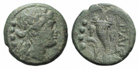 Northern Lucania, Paestum, 218-201 BC. Æ Triens (16mm, 3.68g, 6h). Female head r. wearing ivy wreath; four pellets to l. R/ Cornucopia; four pellets a...
