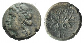Southern Lucania, Thourioi, c. 280-213 BC. Æ (14mm, 3.67g, 3h). Laureate head of Apollo l. R/ Winged thunderbolt; monogram below. HNItaly 1927; SNG Co...