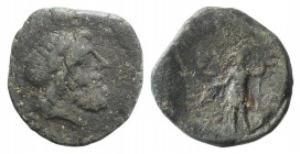 Sicily, Panormos, after 200 BC. Æ (19mm, 4.15g, 1h). Laureate head of Zeus r. R/ Warrior standing l., wearing helmet and cuirass, holding phiale and s...