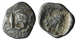 Mysia, Kyzikos, c. 450-400 BC. AR Hemiobol (7mm, 0.27g, 1h). Forepart of boar r.; tunny to l. R/ Head of roaring lion l., retrograde K to l.; all with...