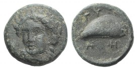 Aeolis, Gyrneion, 4th century BC. Æ (10mm, 1.66g, 5h). Laureate head of Apollo facing slightly l. R/ Mussel shell. SNG von Aulock 7689. Green patina, ...