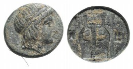 Ionia, Kolophon, c. 400-375 BC. Æ Chalkous (11mm, 1.55g, 1h). Head of Apollo r., wearing tainia. R/ Kithara within linear square; astragaloi to l. and...