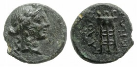 Phrygia, Laodikeia, c. 1st century BC. Æ (14mm, 2.50g, 12h). Laureate head of Apollo r. R/ Tripod. SNG Copenhagen 504. Green patina, Good VF
