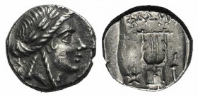 Lycian League, Phaselis, c. 167-100 BC. AR Drachm (14mm, 3.20g, 12h). Laureate head of Apollo r. R/ Lyre; headdress of Isis to l., torch to r. Troxell...