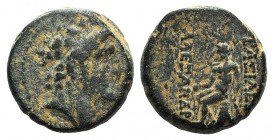 Seleukid Kings, Alexander I Balas (150-145 BC). Æ (19mm, 8.56g, 12h). Diademed head r. R/ Apollo seated l. on omphalos, holding arrow and grounded bow...