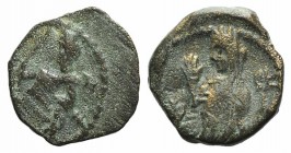 Nabataea, Aretas IV with Shaqilat (9 BC-AD 40). Æ (13mm, 2.35g, 12h). Petra, AD 16. Aretas standing l., holding spear set on ground with r. hand, rest...