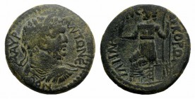 Caracalla (198-217). Uncertain. Æ (24mm, 6.95g, 6h). M AYP ANTΩNEINOC, Laureate, draped and cuirassed bust r. R/ IΛHΛA(?) NEOKOPΩN, Female figure seat...