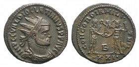 Diocletian (284-305). Æ Radiate (20mm, 3.72g, 12h). Heraclea. Radiate, draped and cuirassed bust r. R/ Aurelian standing r., holding sceptre and recei...