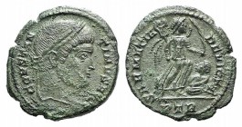 Constantine I (307/310-337). Æ Follis (17mm, 2.91g). Treveri, 323-4. Laureate bust r. R/ Victory advancing r., holding palm in l. hand and trophy with...
