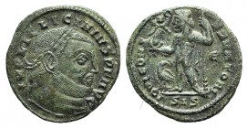 Licinius I (308-324). Æ Follis (21mm, 3.36g, 1h). Siscia, 313-315. Laureate head r. R/ Jupiter standing l., holding globe surmounted by Victory, leani...