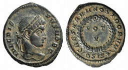 Crispus (Caesar, 316-326). Æ Follis (18mm, 3.34g, 1h). Siscia, 320-1. Laureate head r. R/ VOT/ V in two lines within laurel wreath; BSIS-star. RIC VII...