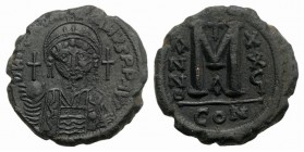 Justinian I (527-565). Æ 40 Nummi (31mm, 16.70g, 7h). Constantinople, year 26 (552/3). Helmeted and cuirassed bust facing, holding globus cruciger and...