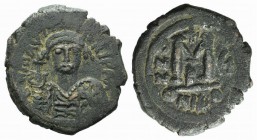 Maurice Tiberius (582-602). Æ 40 Nummi (29mm, 11.84g, 6h). Nicomedia, year 6 (587/8). Helmeted and cuirassed bust facing, holding globus cruciger and ...