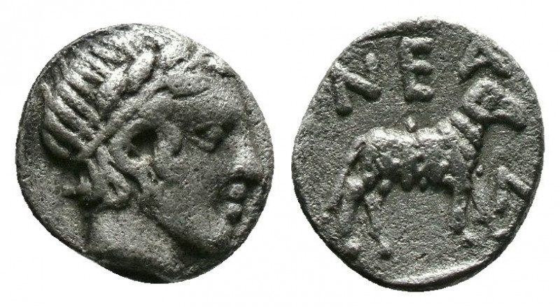 (Silver.0.56g 8mm) TROAS. Neandria. Obol (4th century BC).
 Laureate head of Apo...