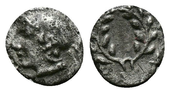 (Silver.0.22g 8mm) AEOLIS. Elaia. Obol (4th-3rd century BC). AR
Helmeted head of...