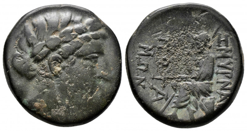 (Bronze.7.90g 23mm) IONIA. Smyrna. Ae (Circa 125-115 BC). Magistrate
Laureate he...