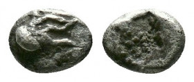 (Silver, 5 mm, 0.17 g). IONIA. Uncertain mint. 5th century BC. Tetartemorion 
Corinthian helmet facing to left. 
Rev. incuse square. 
Cf. Rosen 109 (S...