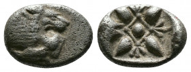 (Silver.1.12g 12mm) IONIA. Miletos. (Circa 6th-5th centuries BC).AR Obol 
Forepart of lion right, 
Rev: Stellate floral design; all within incuse squa...