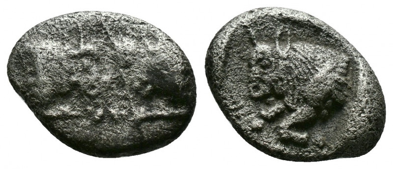 (Silver.1.82g 14mm) Caria. Uncertain mint circa 500-400 BC. Diobol AR
Confronted...