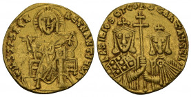 (Gold, 4.45gr 23mm) Basil I AV Solidus. Constantinople, AD 870-871. 
 Christ, nimbate, seated facing, wearing chiton, raising hand in benediction and ...