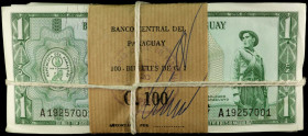 PARAGUAY. Lot of (1000). Banco Central del Paraguay. 1 Guarani, 1952 (1963). P-193b. About Uncirculated to Uncirculated.
An original brick of 1000 no...