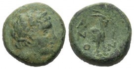 Thrakien. Ainos.

 Bronze. Ca. 280 - 200 v. Chr.
Vs: Kopf des Apollon mit Lorbeerkranz rechts.
Rs: Vorderteil einer Ziege rechts; im Feld rechts K...
