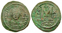 "Justinian I. 527-565. AE follis (41.6 mm, 22.22 g, 7 h). Constantinople mint, Struck 539/40. D N IVSTINI-ANVS P P AVG, helmeted and cuirassed bust of...