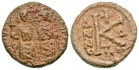 "Justin II. 565-578. AE half follis (18.8 mm, 5.21 g, 7 h). Thessalonica mint, struck 569/570. D N IVSTINVS PP AV, Justin II and Sophia seated on thro...