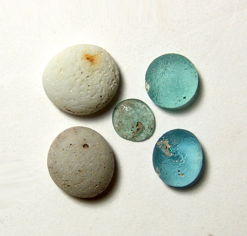 "A group of Roman glass tesserae or gaming tokens, ca. 1st-4th Century A.D. , ea...