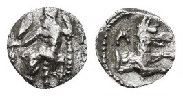 Cilicia. Uncertain mint circa 400-300 BC. Obol AR (9.6mm., 0,71g) . Baaltars seated left, holding grain ear and grapes in his right and sceptre in his...