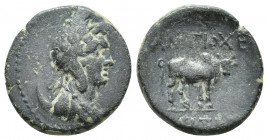 Pisidia, Antioch Æ 18mm. 1st century BC. (19mm, 4.1 g) Uncertain magistrate. Draped bust of Mên to right, wearing Phrygian cap, set on crescent / Hump...