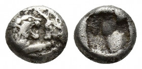 Kings of Lydia, Kroisos AR 1/12 Stater. Sardes, circa 550-546 BC. (7.5mm, 0.9 g) Confronted foreparts of lion and bull / Incuse punch.