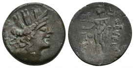 Cilicia, Korykos Æ (20.5mm. 5.41 g) 1st century BC. Turreted head of Tyche to right; AK behind / KΩPYKIΩT[ΩN], Hermes standing to left, holding keryke...