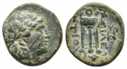 SELEUKID KINGS of SYRIA. Antiochos II Theos. 261-246 BC. Æ (17mm, 4.00g ). Sardes mint. Laureate head of Apollo right / Tripod; monogram to outer left...